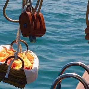 ash scattering service aboard a classic wooden boat